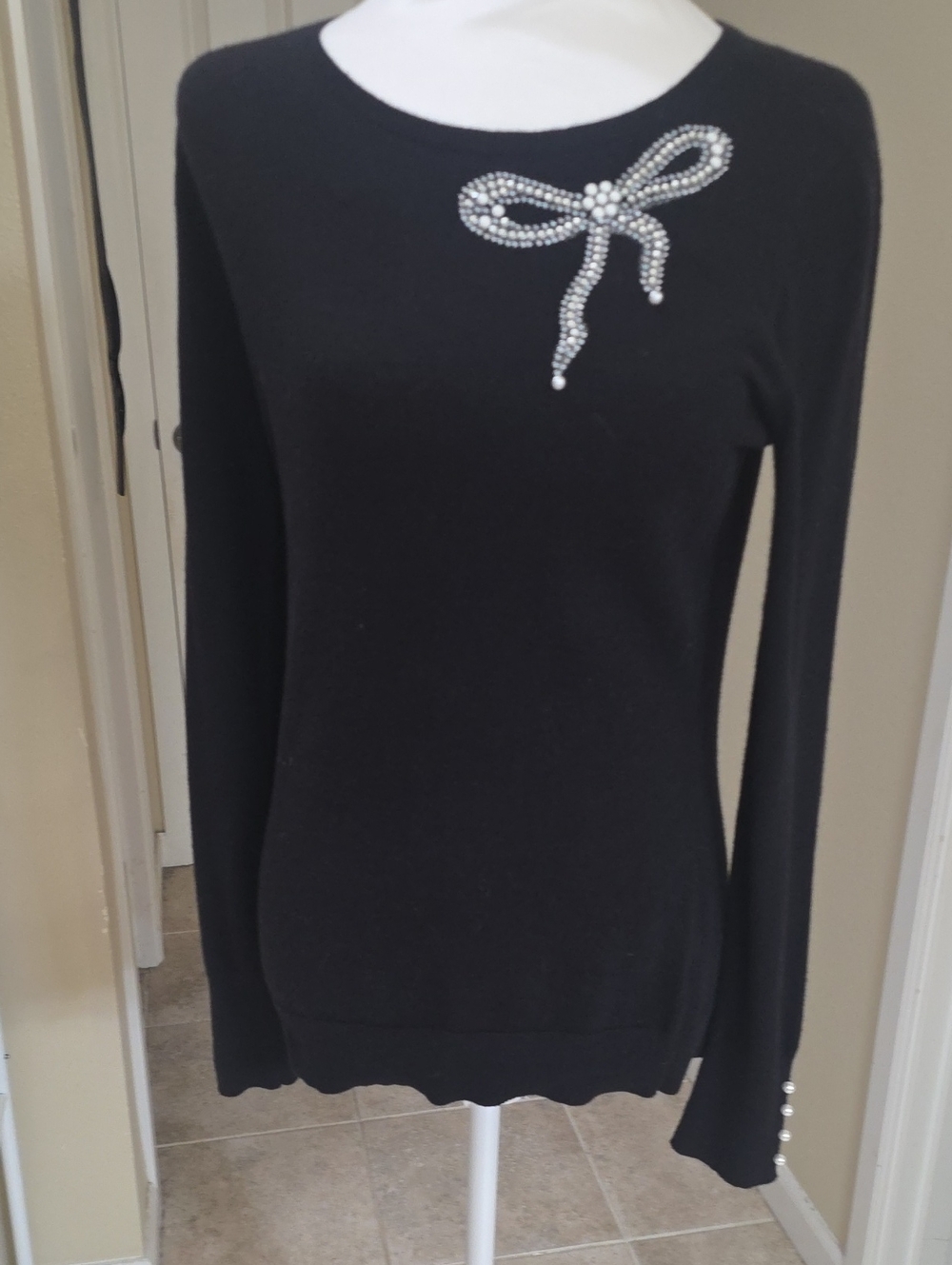Elle Black Long-Sleeve Sweater with Rhinestone Bow Accent